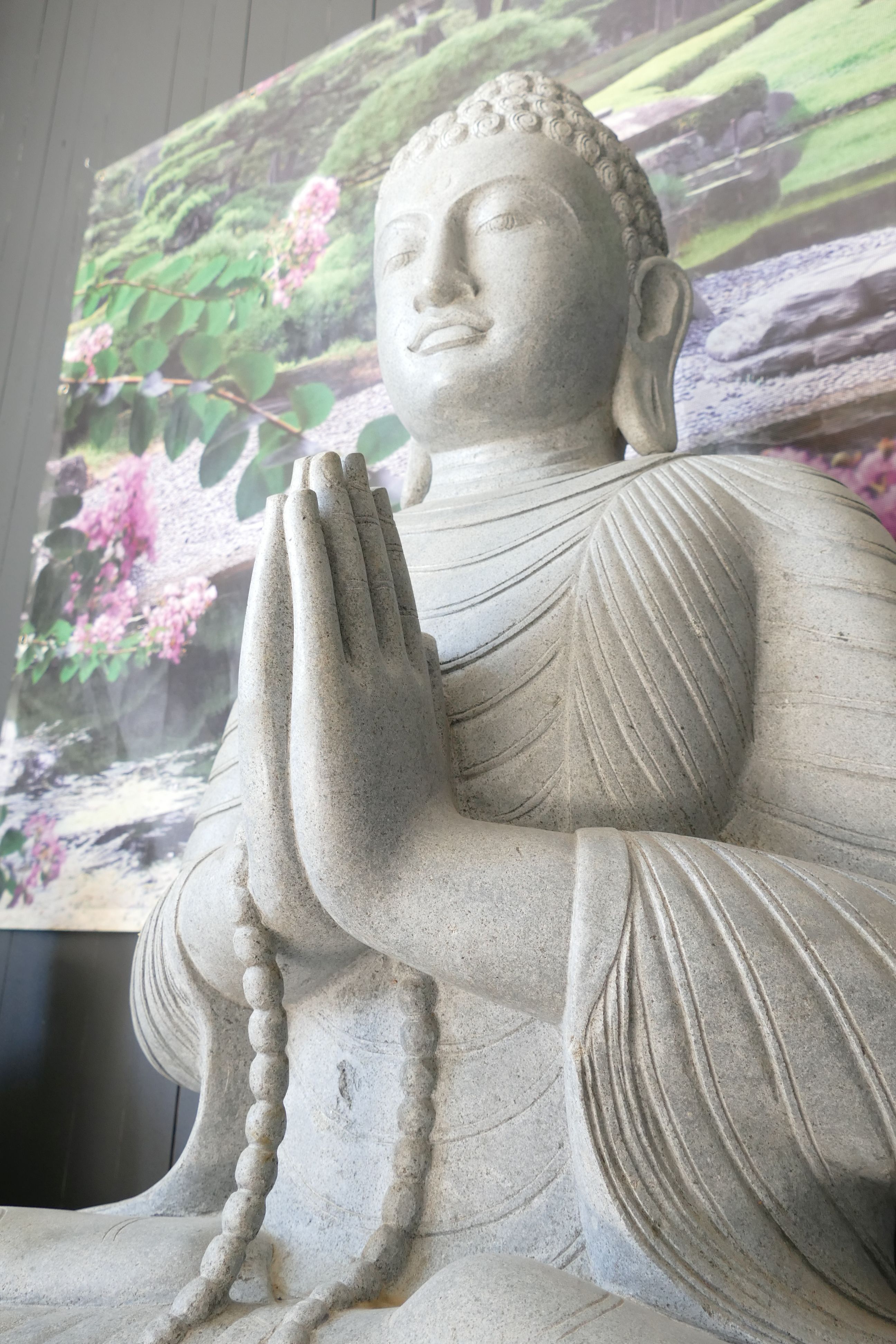 Sitzender Buddha aus Riverstone - 150cm