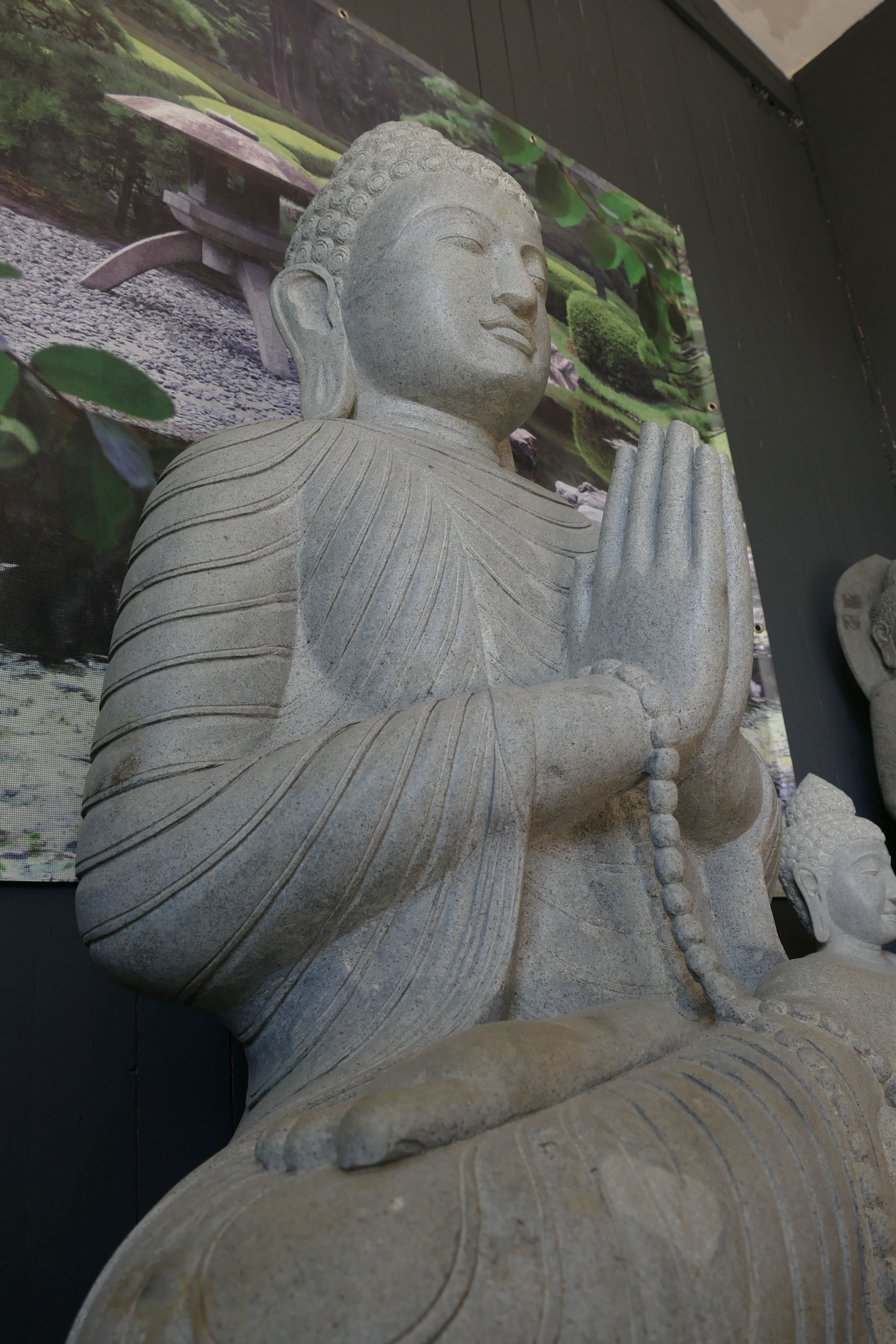 Sitzender Buddha aus Riverstone - 150cm